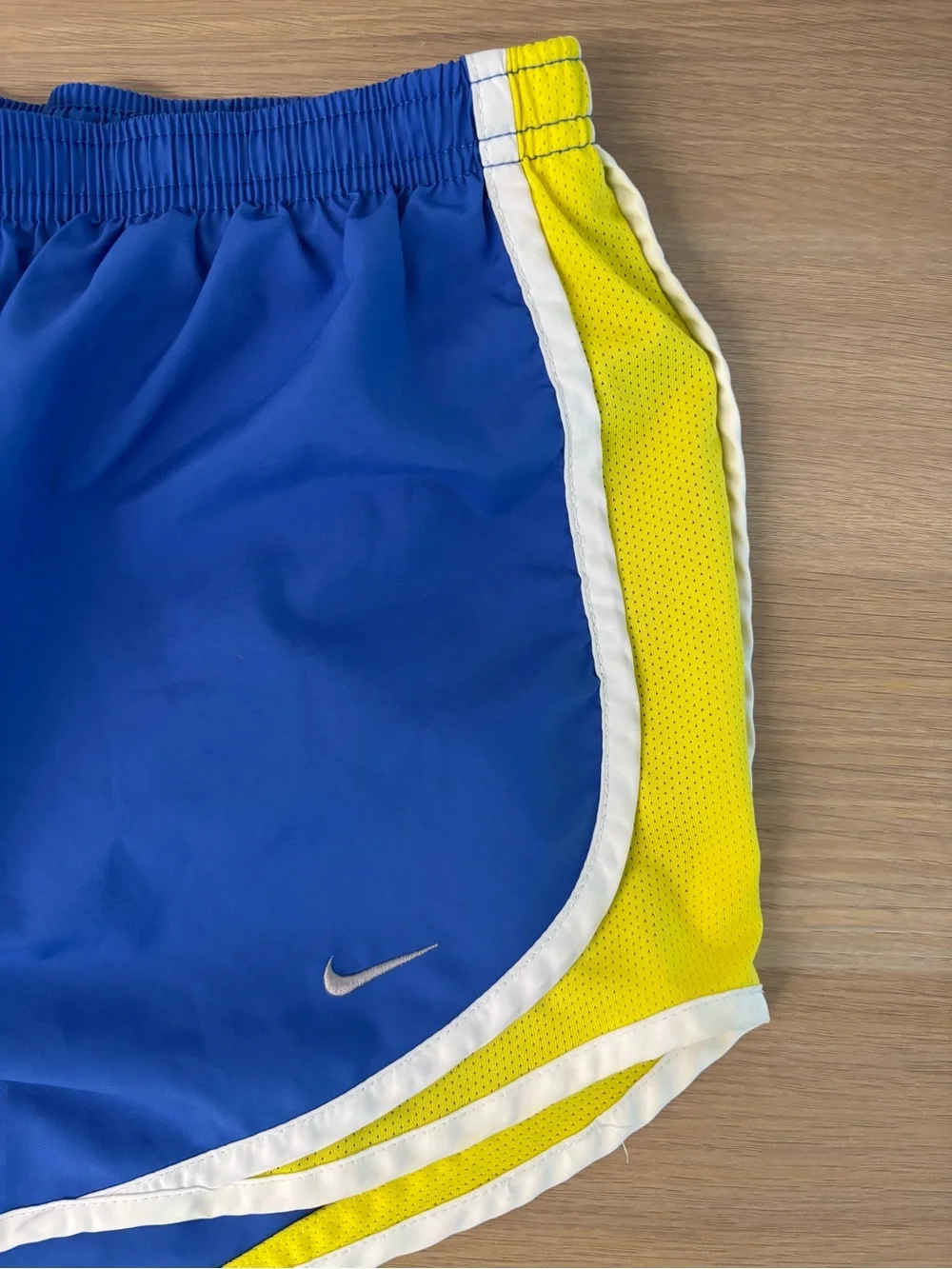Nike Girl’s Blue and‎ Yellow Running Shorts